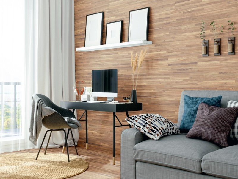 Wandpaneele gliedern große Räume in Zonen und sorgen für eine individuelle Ausstrahlung Eine Wand im Wohnzimmer ist mit dem gleichen Parkett verkleidet wie der Fußboden